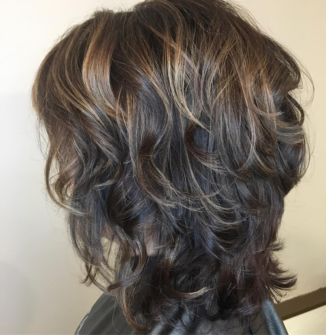 short haircuts for women over 50 with curly hair