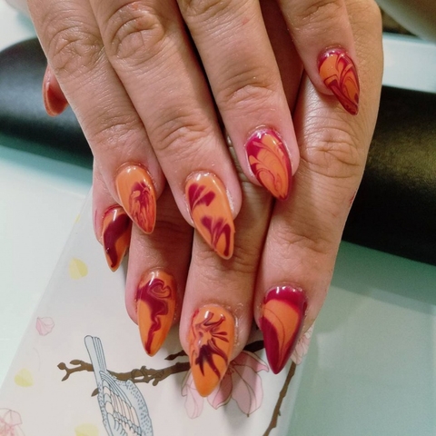 orange and red swirl nail designs
