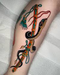 snake and dagger tattoos